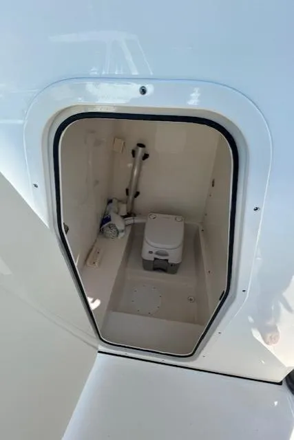 Slide: The Image of 2022 Sea Born LX26 Center Console boat interior storage compartment. - 9