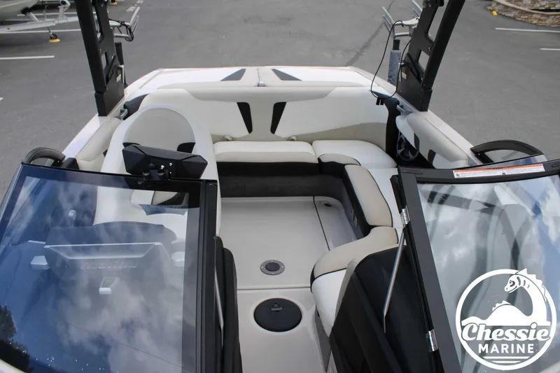 Slide: The Image of 2017 Malibu Wakesetter 20 VTX interior with seating and windshield, Chessie Marine logo visible. - 13