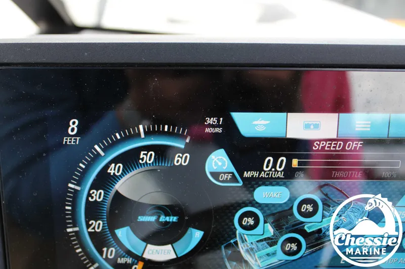 Slide: The Image of Dashboard of 2017 Malibu Wakesetter 20 VTX showing speed, throttle, and hours. - 15
