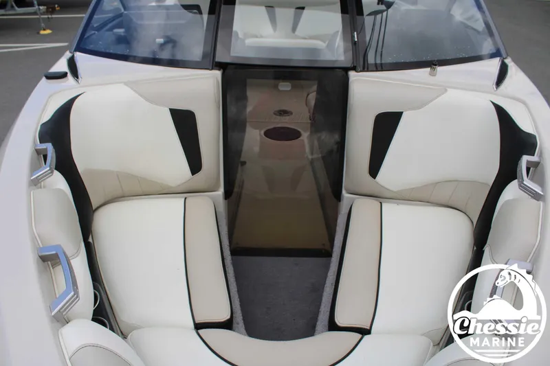Slide: The Image of 2017 Malibu Wakesetter 20 VTX interior with white and black seating, Chessie Marine logo. - 9