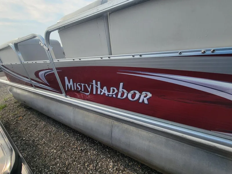 Slide: The Image of 2011 Misty Harbor 2285 DR pontoon boat with red and silver detailing. - 6