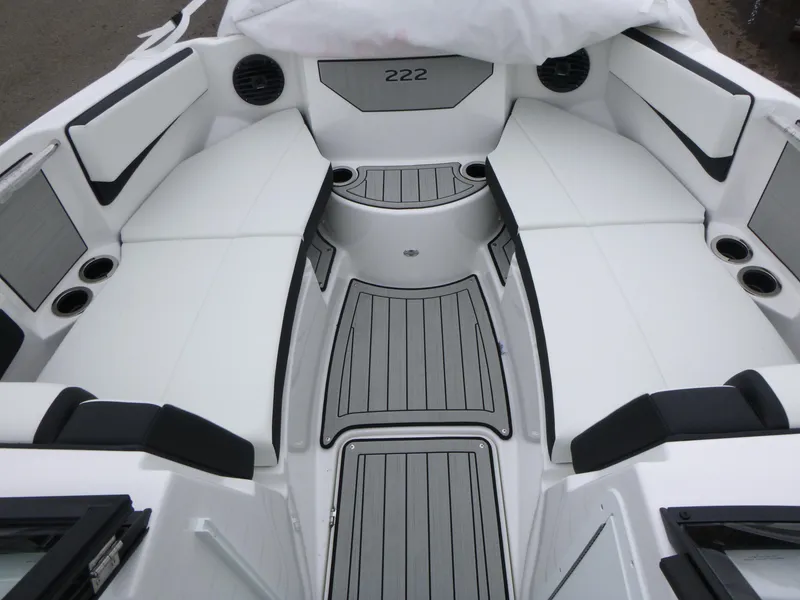 Slide: The Image of 2025 Yamaha Boats 222SD interior with sleek white seating and modern design. - 9