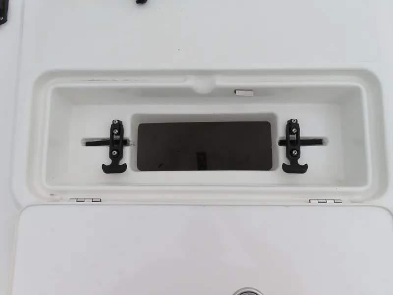 Slide: The Image of Parker 2300 Special Edition 2021 boat compartment with secure latches and sleek design. - 10