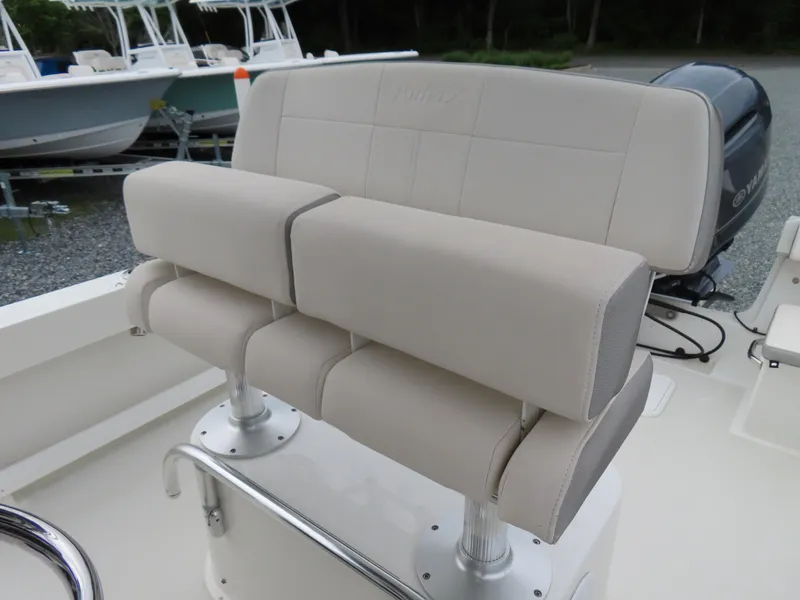 Slide: The Image of 2021 Parker 2300 Special Edition boat seating with cushioned backrest and armrests. - 14