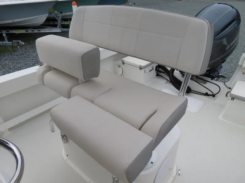 Slide: The Image of 2021 Parker 2300 Special Edition boat seat with cushioned backrest and armrests. - 15