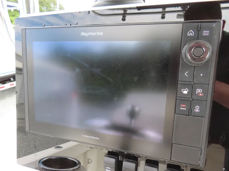 Slide: The Image of Raymarine touchscreen display on 2021 Parker 2300 Special Edition boat dashboard. - 17