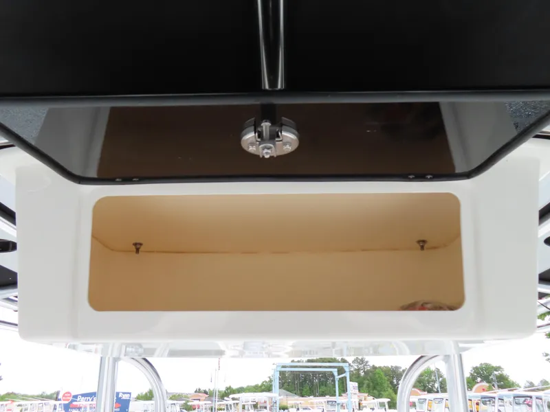 Slide: The Image of Storage compartment on a 2021 Parker 2300 Special Edition boat. - 21