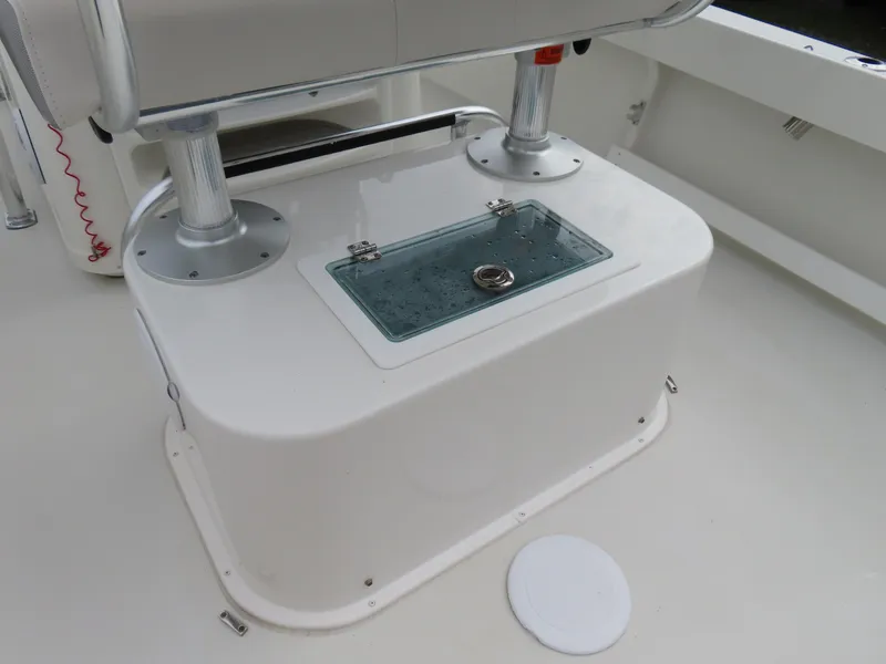 Slide: The Image of 2021 Parker 2300 Special Edition boat console with storage compartment. - 22