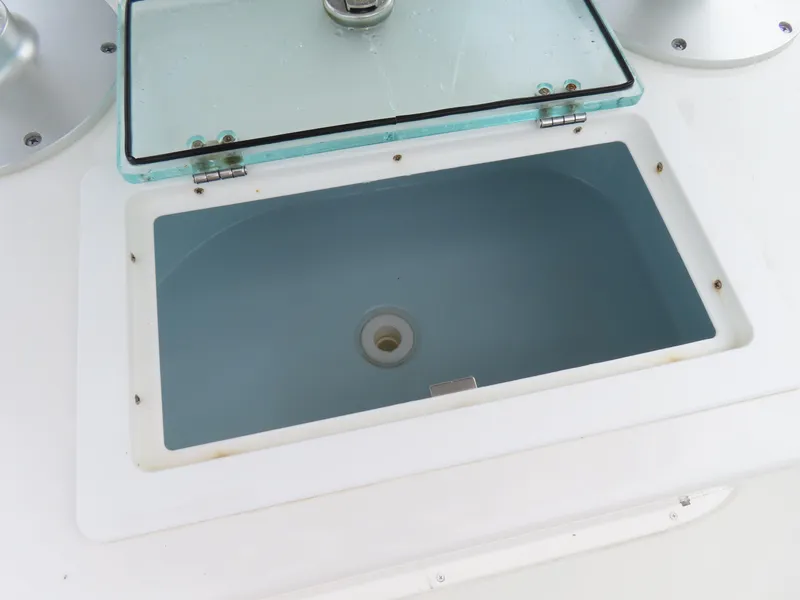 Slide: The Image of Livewell on 2021 Parker 2300 Special Edition boat with glass lid. - 23