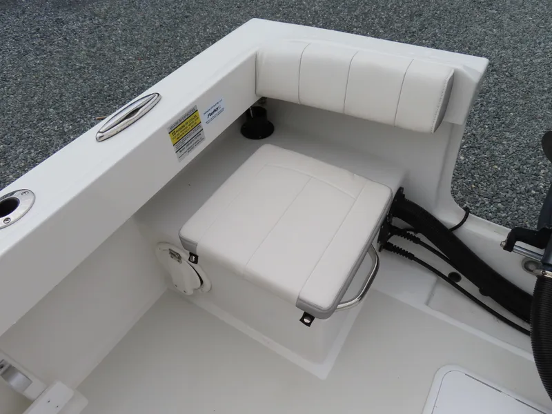 Slide: The Image of 2021 Parker 2300 Special Edition boat seating area with white cushioned seat and backrest. - 25