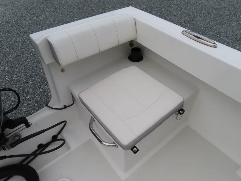 Slide: The Image of 2021 Parker 2300 Special Edition boat seat with white cushioned design. - 28