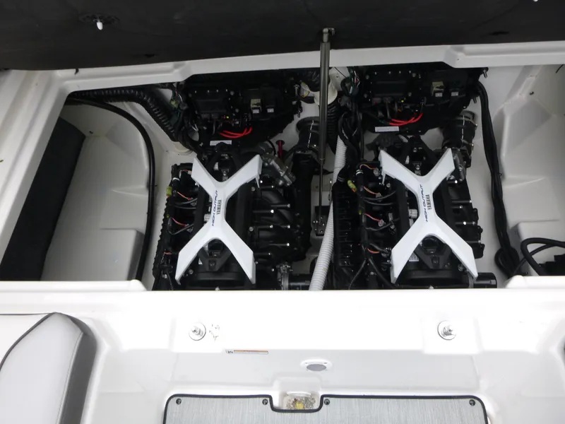 Slide: The Image of Engine compartment of 2025 Yamaha Boats AR250, showcasing dual engines and modern design. - 11