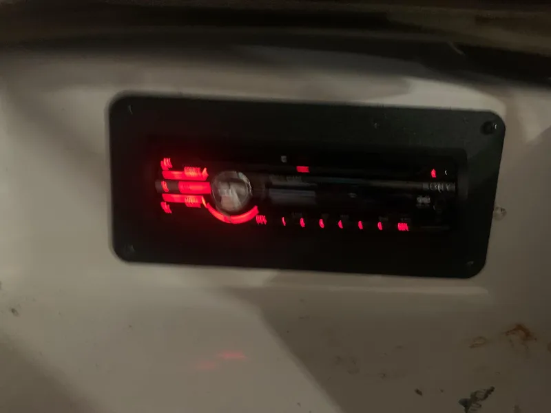 Slide: The Image of 2012 Glastron GLS 195 stereo system with red LED display. - 16