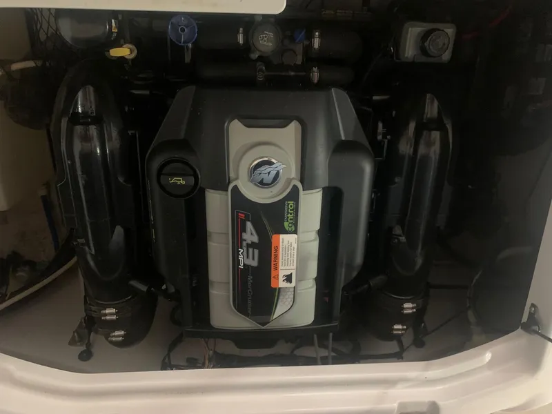 Slide: The Image of Engine of 2012 Glastron GLS 195 boat, showcasing detailed components. - 23