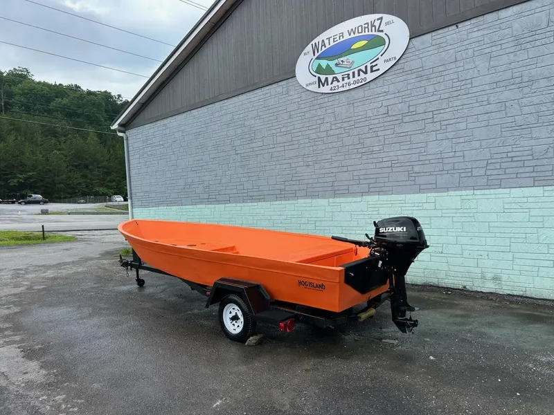 The Image of 2024 Hog Island Boat Works SW16 in orange, on trailer, outside Water Workz Marine. - 0