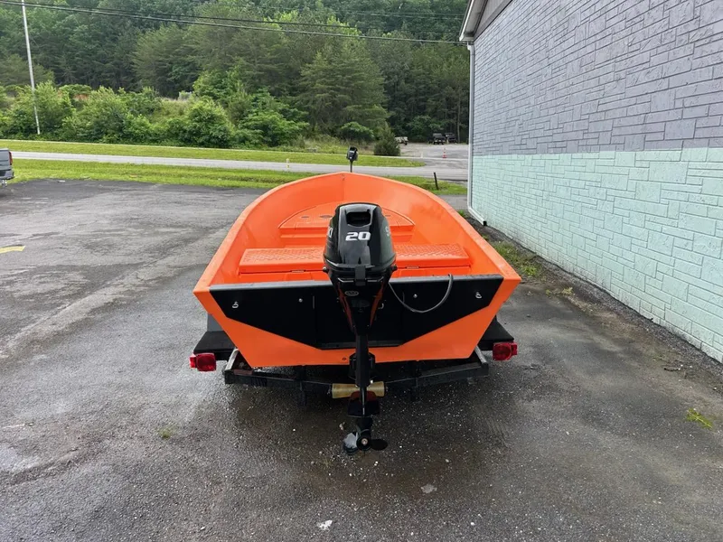 Slide: The Image of 2024 Hog Island Boat Works SW16 with 20HP motor, parked outdoors. - 3