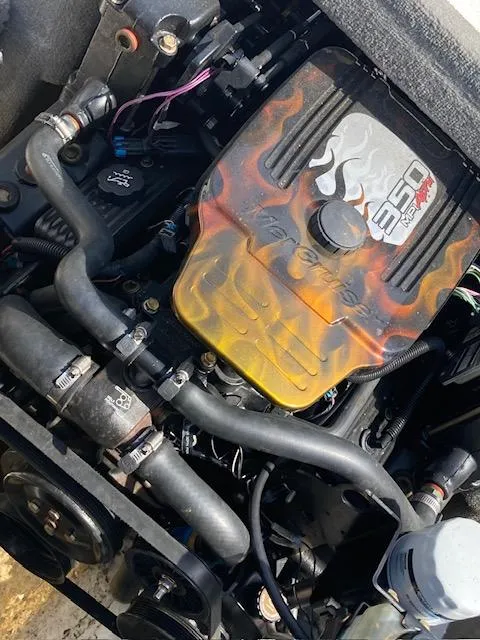 Slide: The Image of 2008 Sea Ray 205 Bow Rider engine with custom flame design cover. - 4