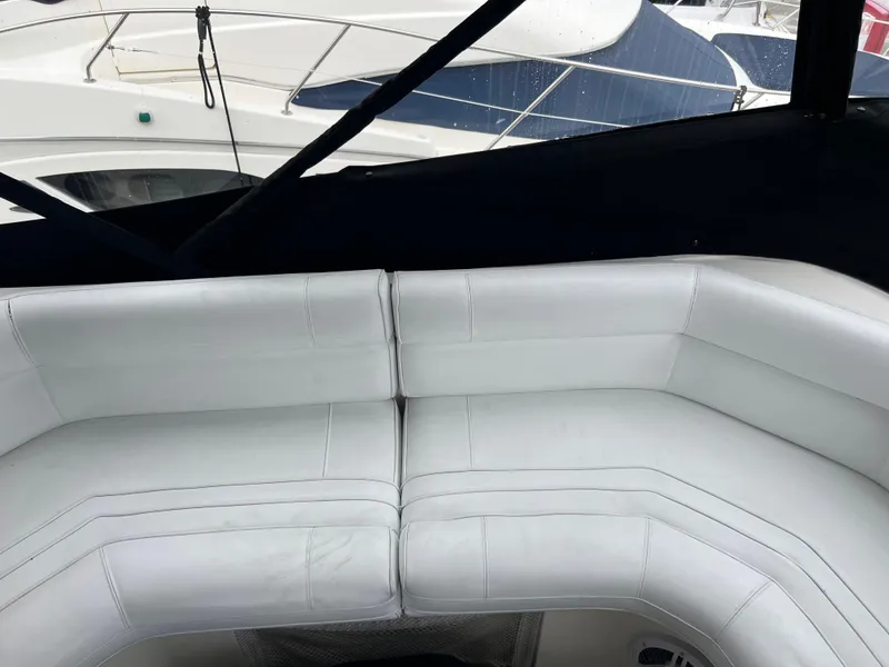 Slide: The Image of White leather seating on 1995 Cruisers Yachts 3650 ACMY boat deck. - 36