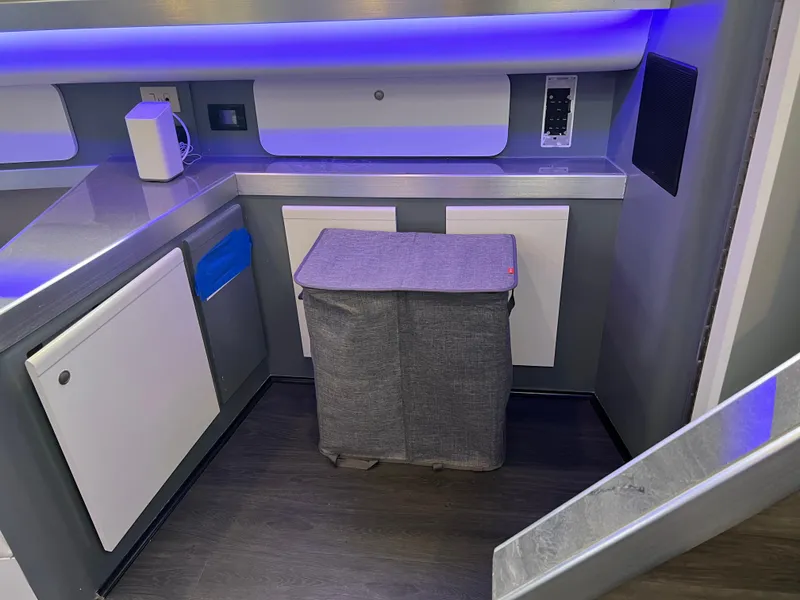 Slide: The Image of Modern interior of 1995 Cruisers Yachts 3650 ACMY with sleek cabinetry and ambient lighting. - 39