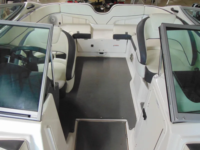 Slide: The Image of 2014 Yamaha Boats SX210 interior with seating and steering wheel. - 10