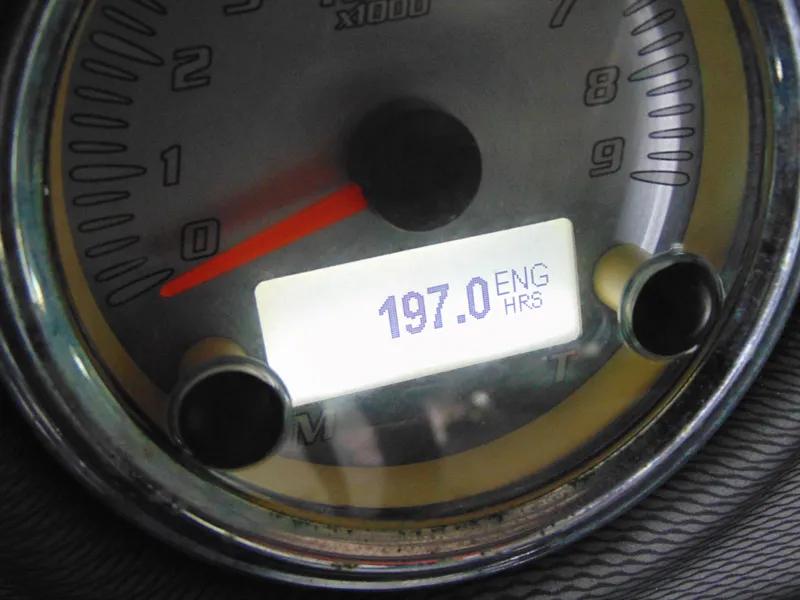Slide: The Image of Close-up of a 2014 Yamaha SX210 boat tachometer showing 197 engine hours. - 14