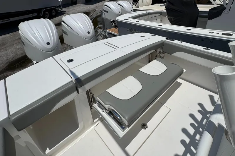 Slide: The Image of 2025 Regulator 28 boat with foldable seating and multiple outboard engines. - 4