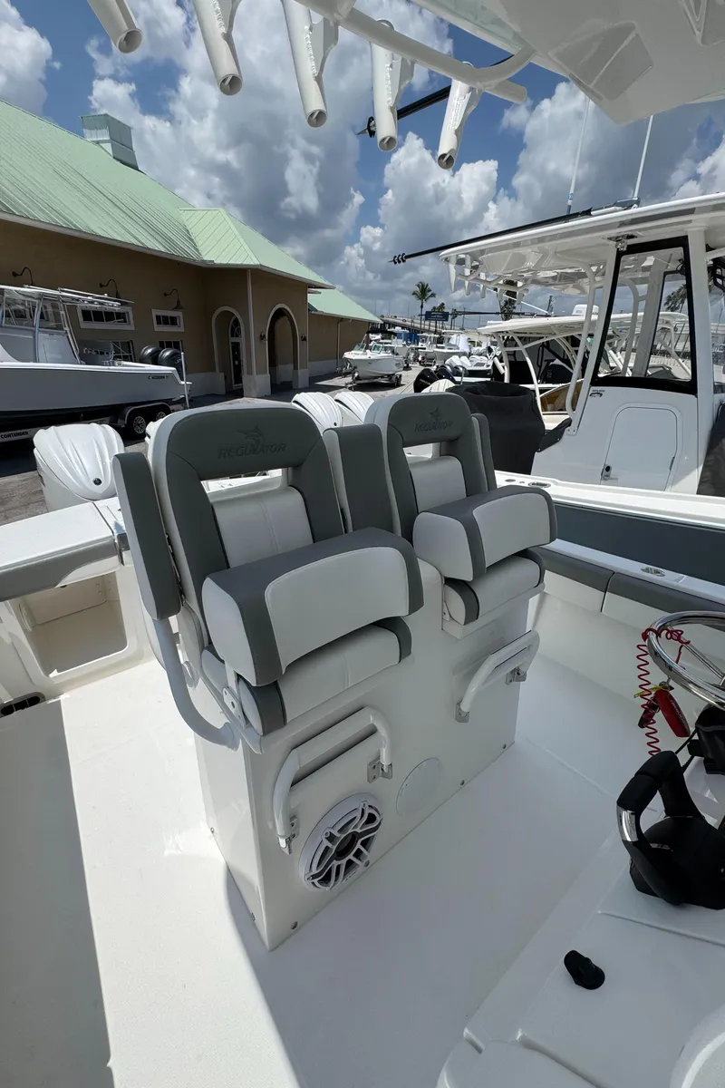 Slide: The Image of 2025 Regulator 28 boat interior with dual seats and modern design. - 7