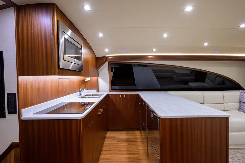 Slide: The Image of Luxurious interior of 2022 F&S 58 Custom Carolina yacht with modern kitchen design. - 23