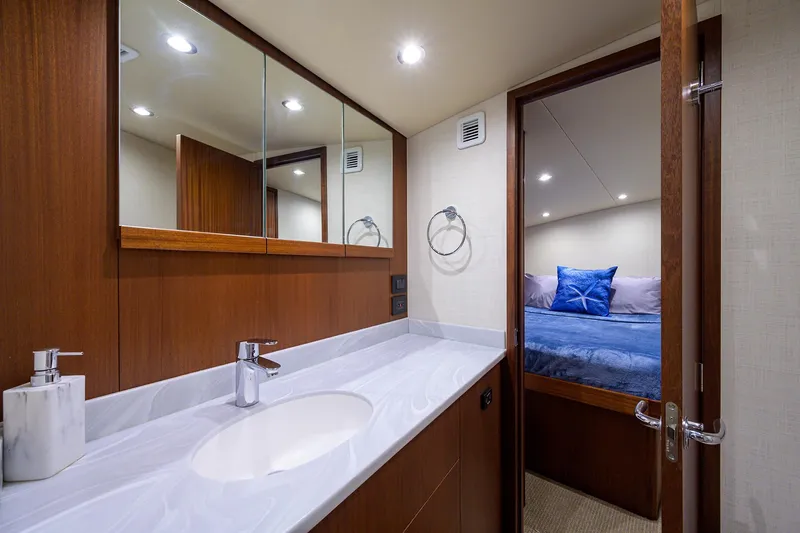 Slide: The Image of Luxurious bathroom and bedroom in 2022 F&S 58 Custom Carolina yacht. - 31