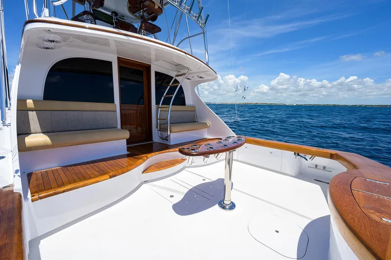 Slide: The Image of Luxury 2022 F&S 58 Custom Carolina yacht deck with seating, ocean view. - 6