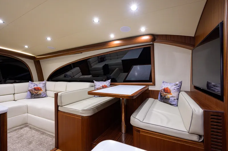 Slide: The Image of Luxurious interior of 2022 F&S 58 Custom Carolina yacht with elegant seating and modern design. - 9