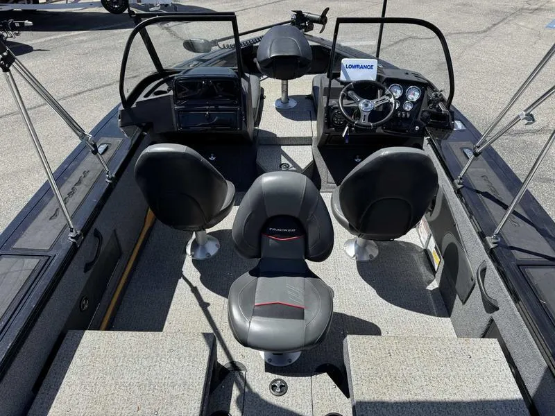Slide: The Image of 2023 Tracker Targa 18 boat interior with seating and control panel. - 4