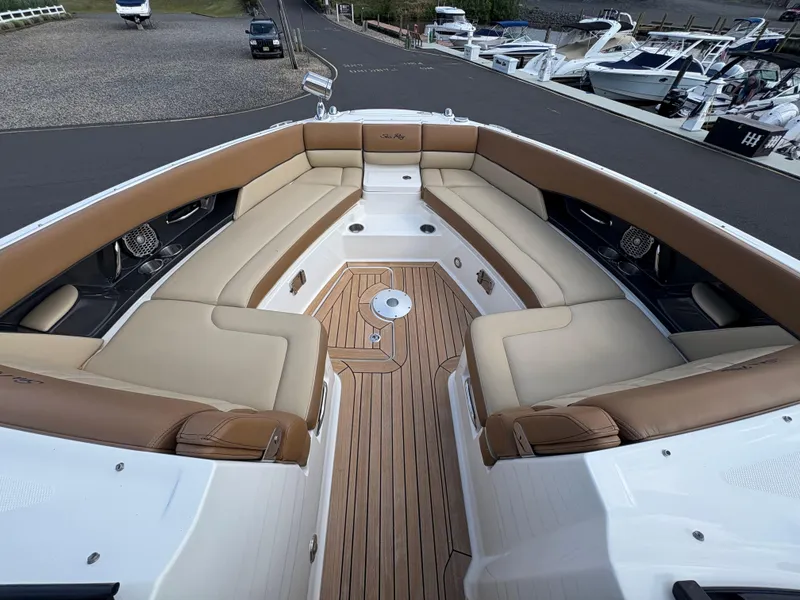 Slide: The Image of Luxurious 2015 Sea Ray 350 SLX boat interior with spacious seating and elegant design. - 16