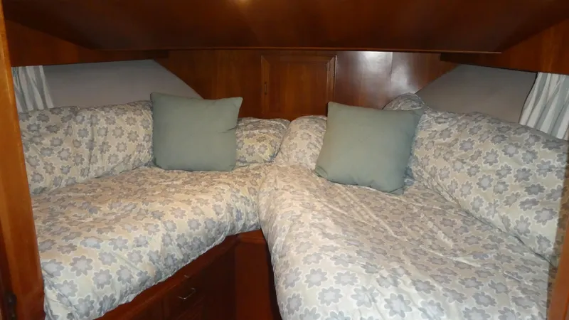 Slide: The Image of 1993 Ocean Alexander 440 Sundeck CPMY cabin with twin beds and floral bedding. - 35