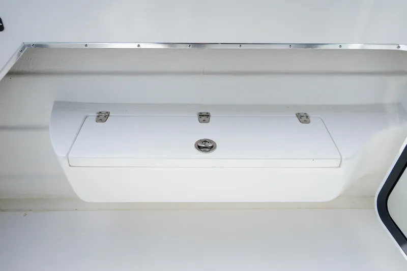 Slide: The Image of Storage compartment on a 2021 C-Dory 25' Cruiser boat interior. - 9