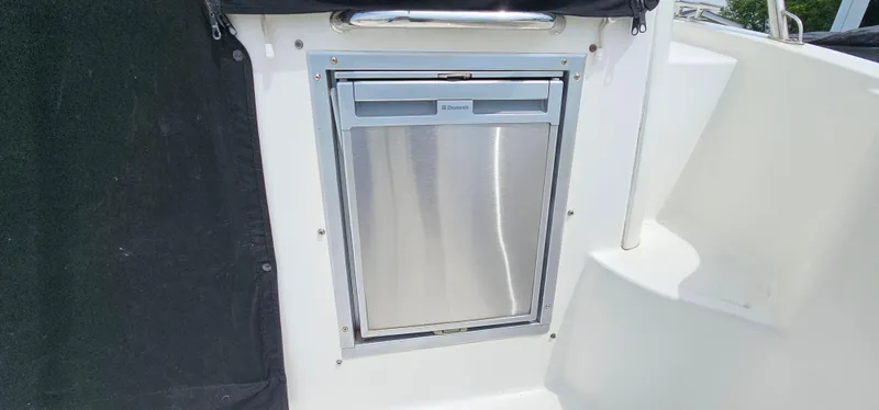 Slide: The Image of Stainless steel refrigerator on 2016 Boston Whaler 285 Conquest boat. - 10