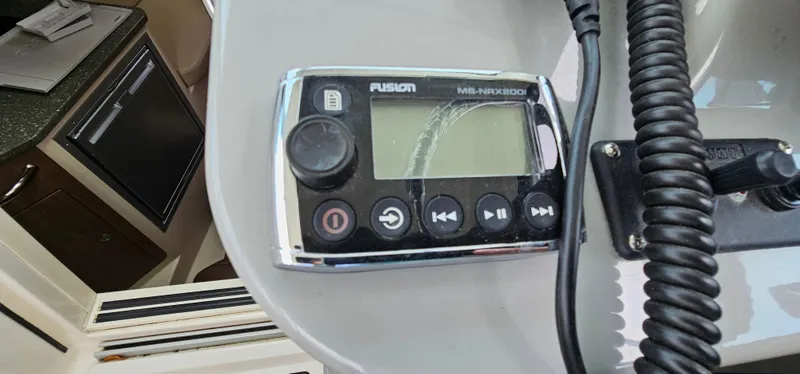 Slide: The Image of Fusion marine stereo on 2016 Boston Whaler 285 Conquest boat dashboard. - 29