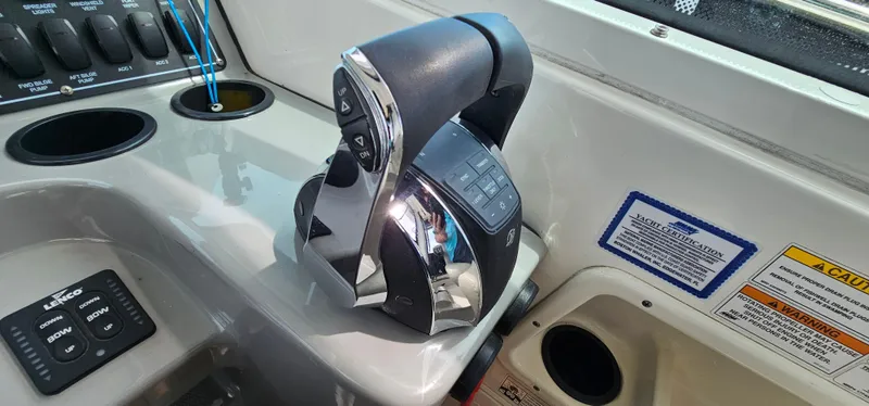 Slide: The Image of Control panel of a 2016 Boston Whaler 285 Conquest boat. - 30