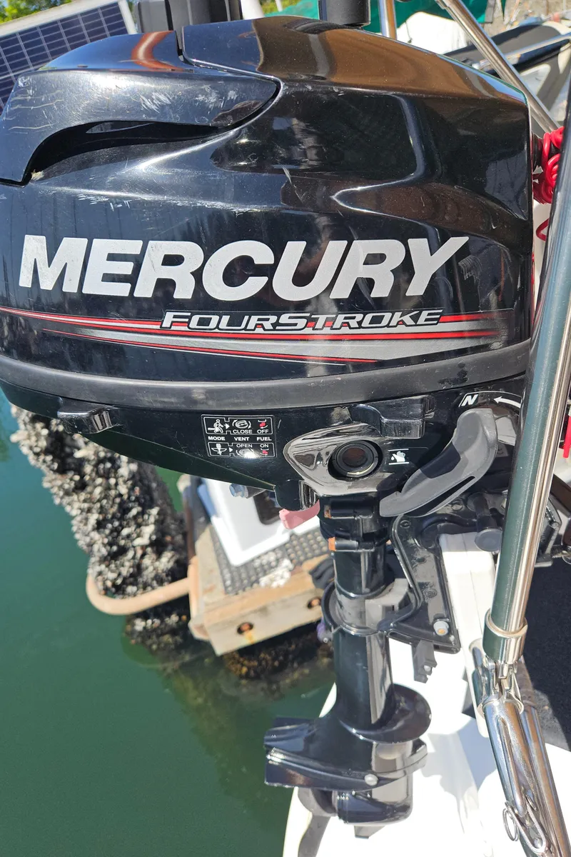 Slide: The Image of Mercury FourStroke outboard motor on a 2008 Beneteau 323 sailboat. - 29