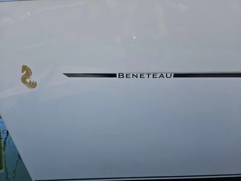 Slide: The Image of Beneteau 323 sailboat logo on hull, 2008 model. - 5