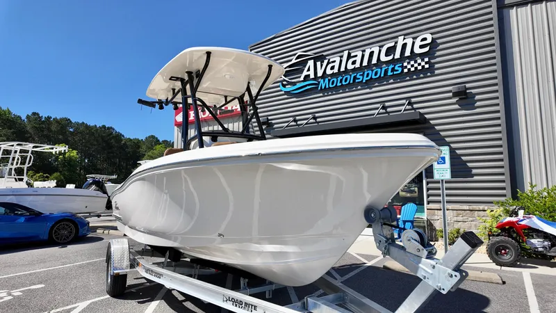 Slide: The Image of 2025 Pioneer 202 Islander boat on trailer at Avalanche Motorsports dealership. - 13