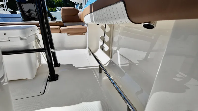 Slide: The Image of 2025 Pioneer 202 Islander boat interior with seating and storage features. - 9