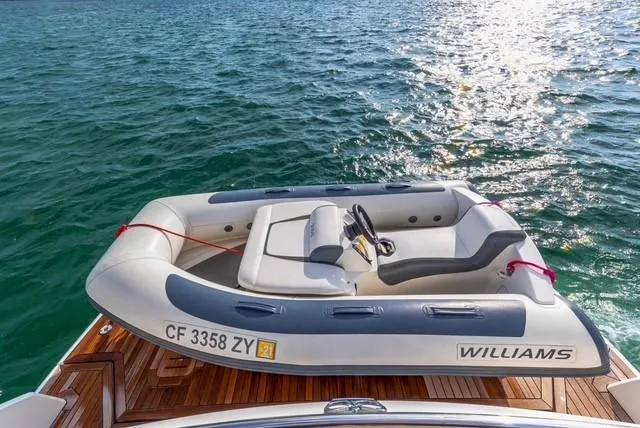 Slide: The Image of Inflatable boat on Princess V48 Open yacht, 2017 model, floating on clear water. - 30