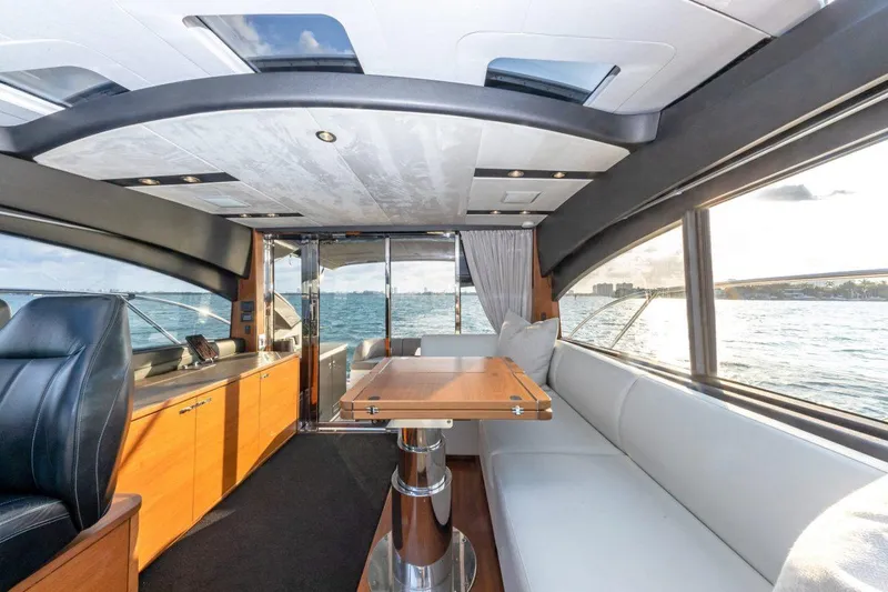 Slide: The Image of Interior of 2017 Princess V48 Open yacht with modern seating and ocean view. - 9