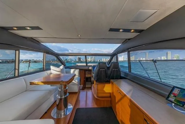 Slide: The Image of Interior of 2017 Princess V48 Open yacht with city skyline view. - 17