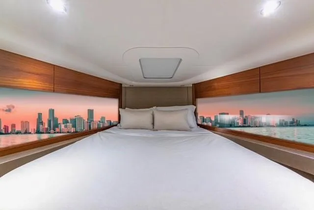 Slide: The Image of Luxurious cabin interior of 2017 Princess V48 Open yacht with cityscape view. - 24