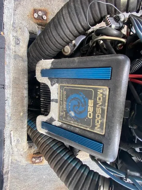 Slide: The Image of 1998 Malibu Response engine compartment with Monsoon 320 engine components. - 27
