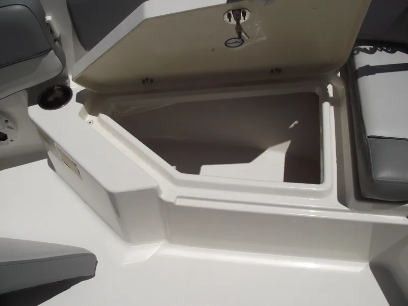 Slide: The Image of Open storage compartment on 2022 NauticStar 191 Hybrid boat. - 10