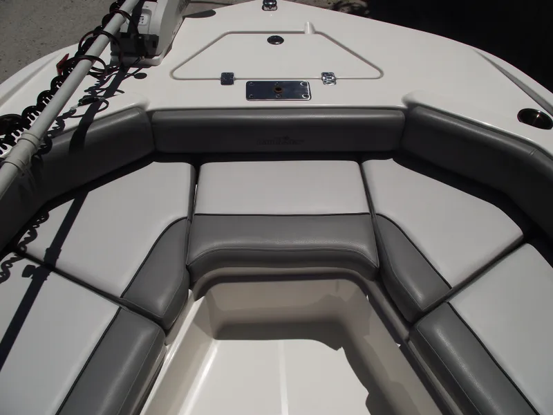 Slide: The Image of 2022 NauticStar 191 Hybrid boat interior with cushioned seating. - 11