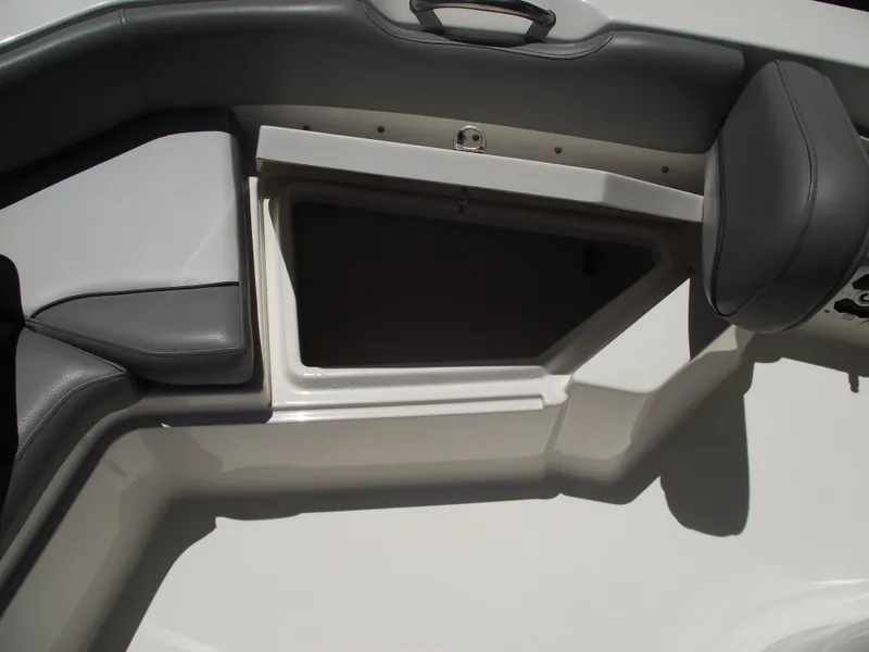Slide: The Image of 2022 NauticStar 191 Hybrid boat storage compartment with cushioned seating. - 16